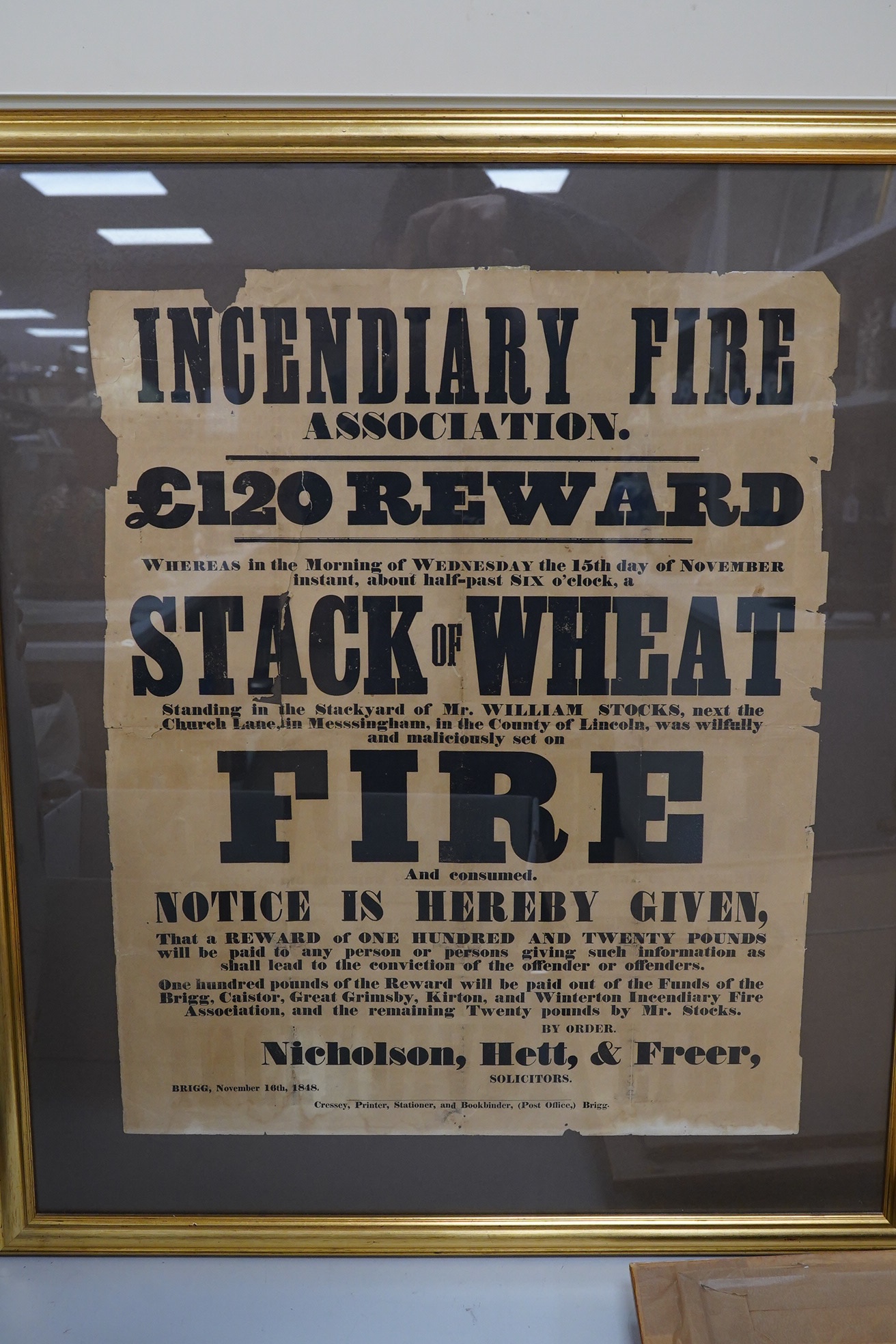 An Incendiary Fire Reward poster and three French Shipping sales posters, framed and glazed. Condition - poor to fair